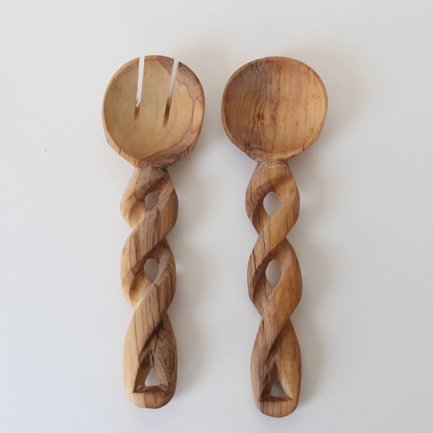 Twisted wood serving spoons.